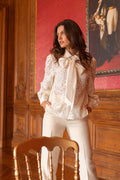 Lace blouse with lavallière bow