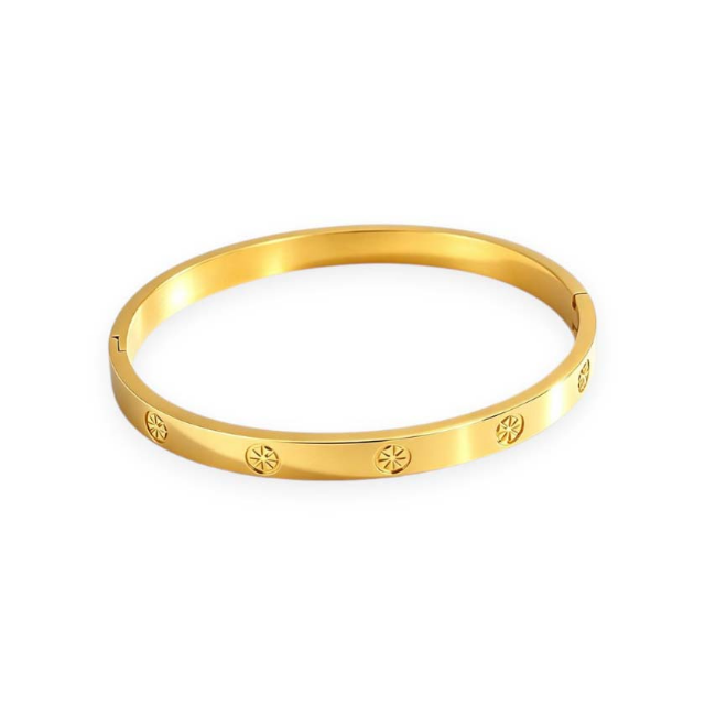 Engraved compass bangle in gold